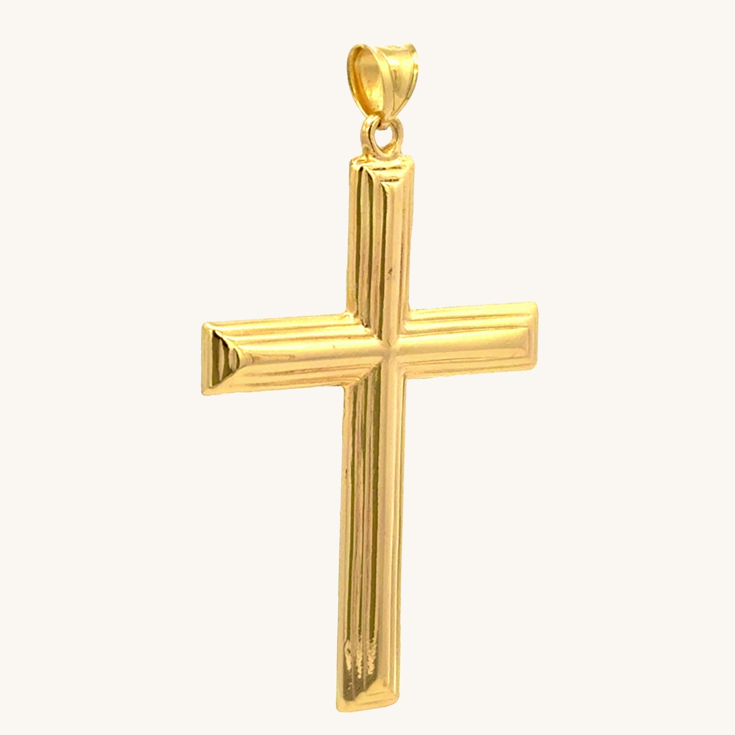 14K yellow gold XXL cross pendant with polished beveled edges handcrafted religious jewelry made in the USA angled image