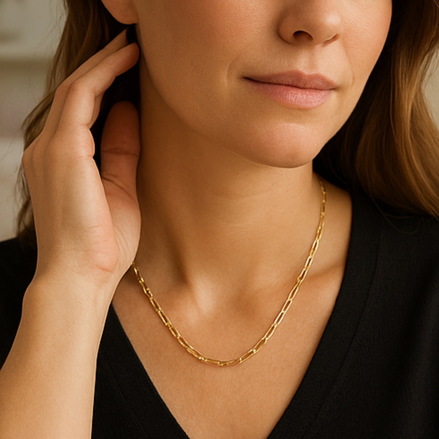 14K Yellow Gold 16-18" Adjustable Paperclip Chain lifestyle on woman