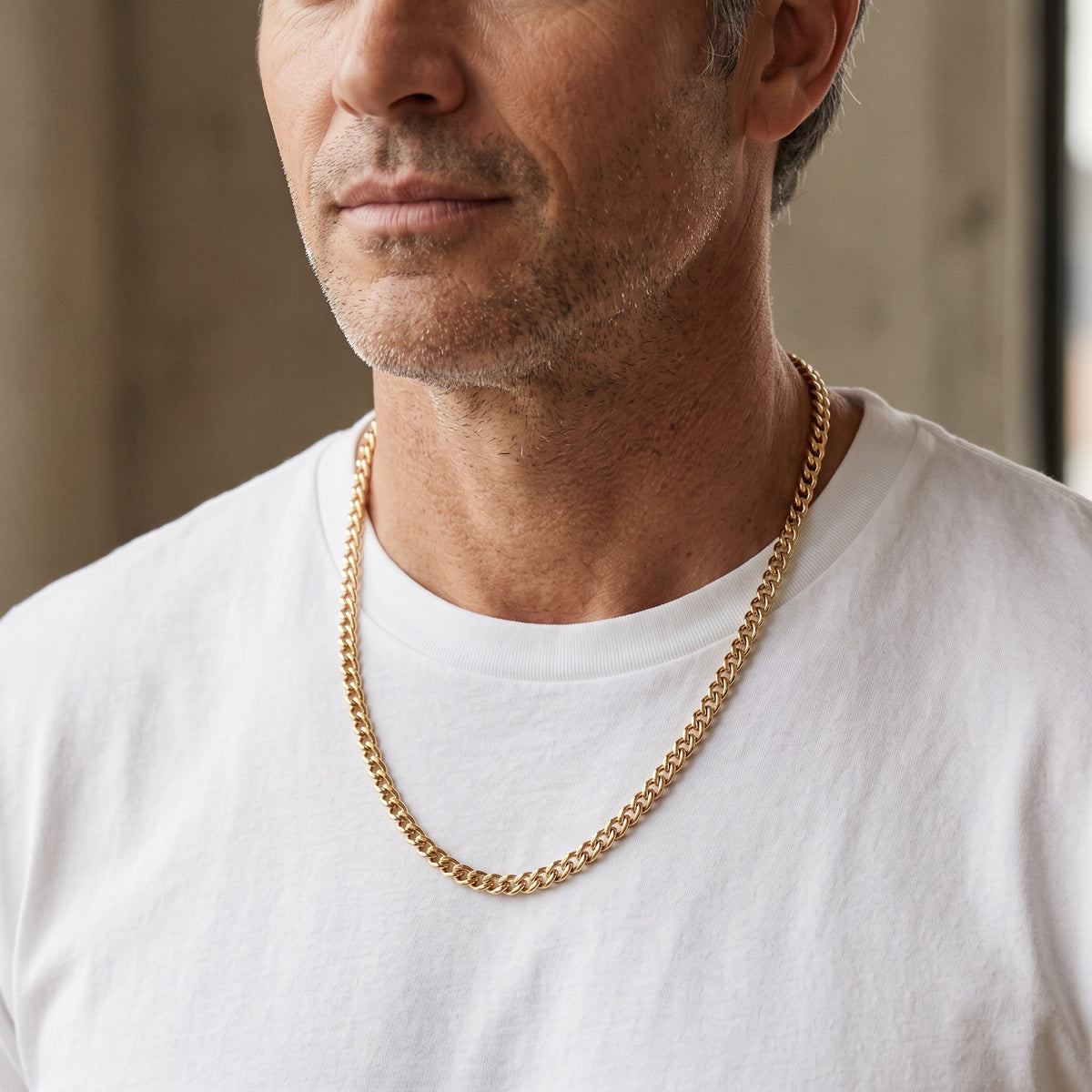 Solid 14K Double Bonded Gold 4mm Cable chain with Lobster clasp available in Length 20 inch 22 inch 24 inch lifestyle on man image