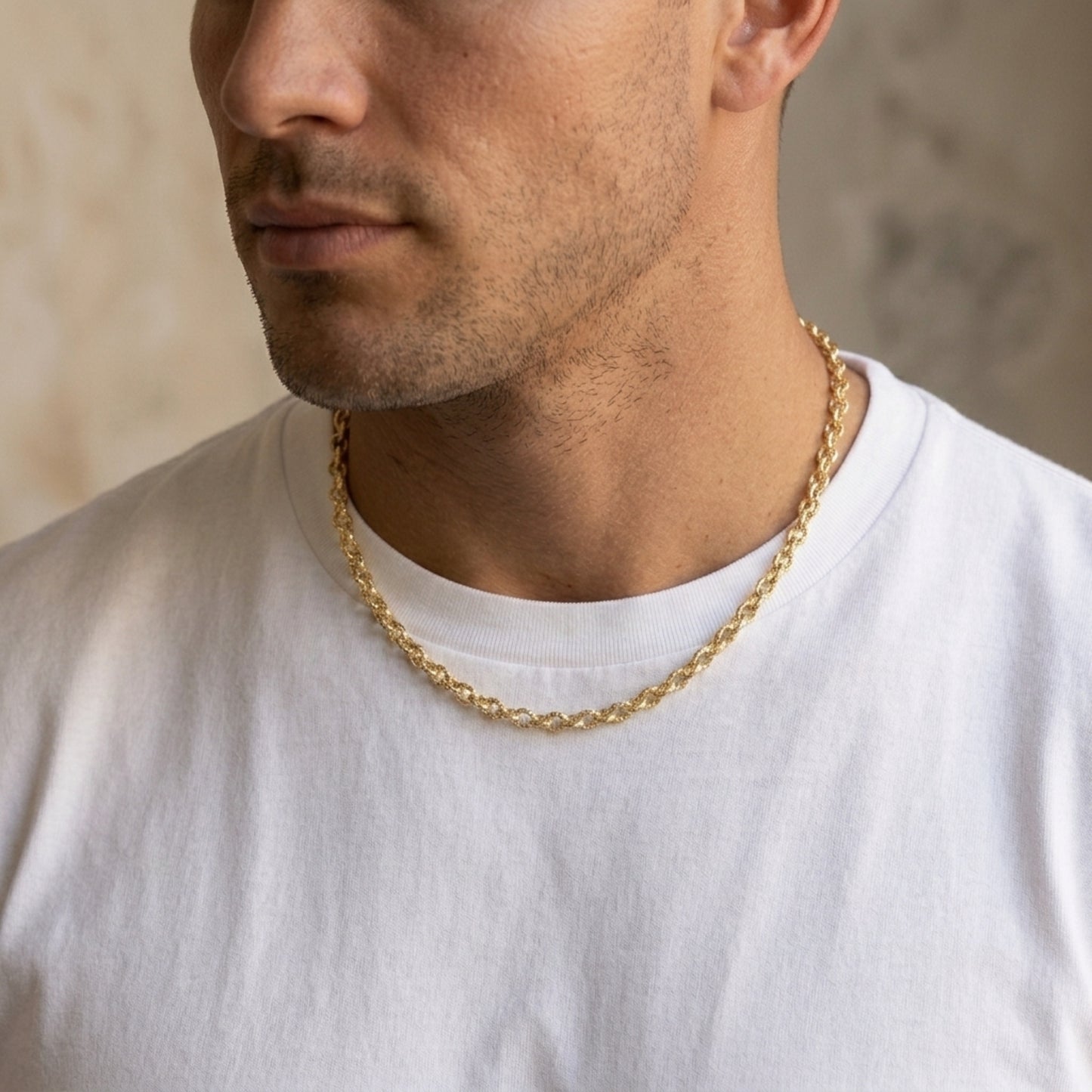 Solid 14K Double Bonded Gold 3.3mm Cable chain with Lobster clasp available in Length 16" 18" 20" lifestyle on man image
