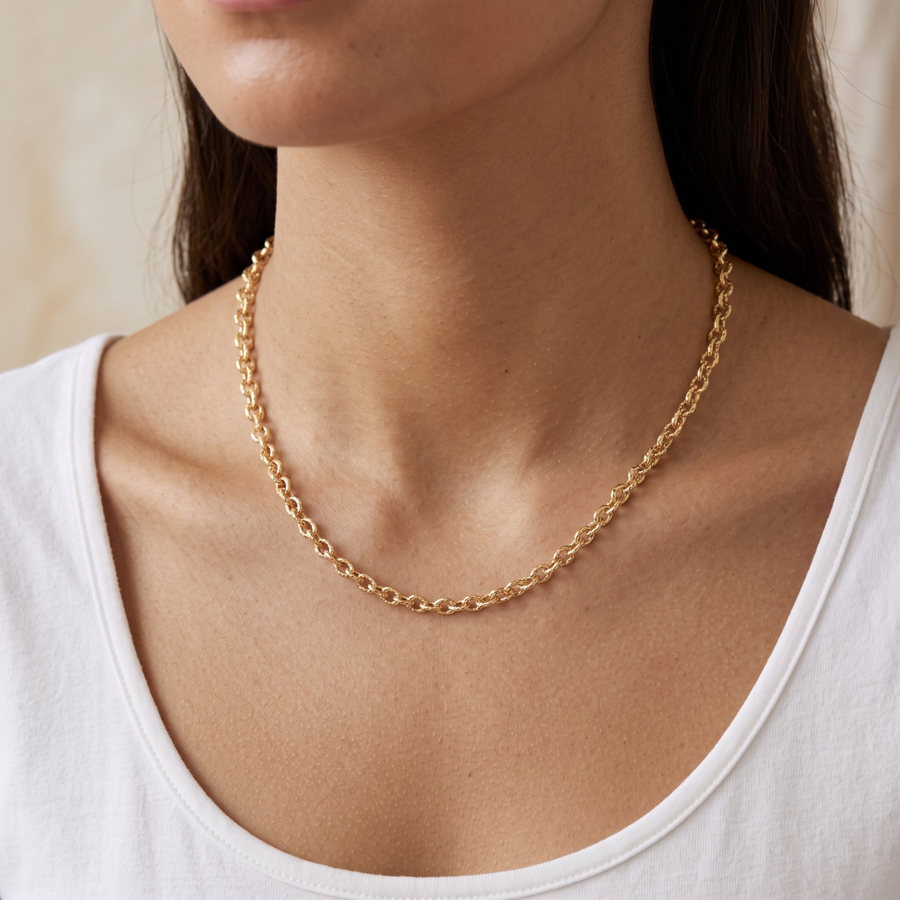Solid 14K Double Bonded Gold 3.3mm Cable chain with Lobster clasp available in Length 16" 18" 20" lifestyle on woman image