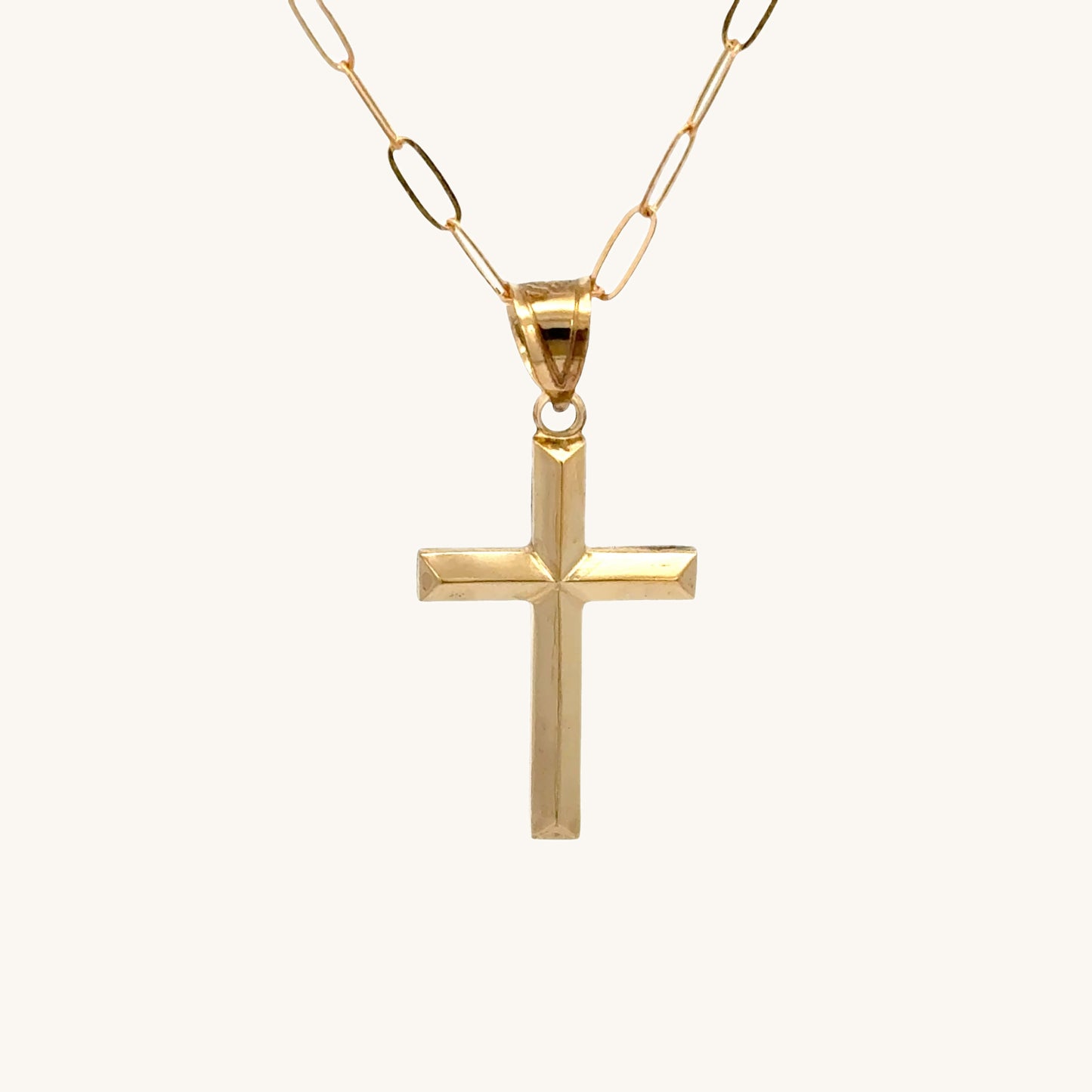 Small 14K double‑bonded gold simple cross pendant high‑polish finish on 16-18" paperclip chain main image