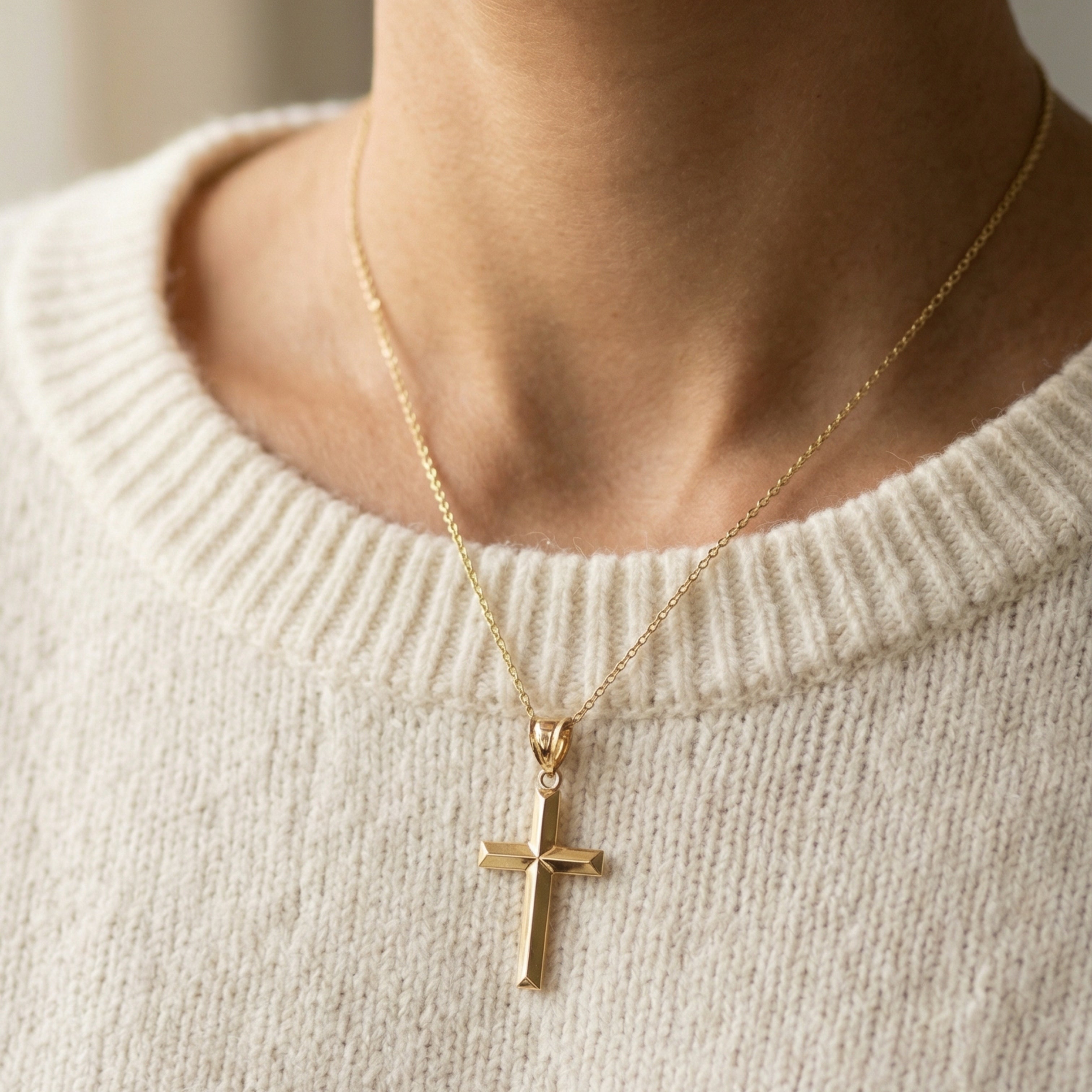 Large 14K double‑bonded gold simple cross pendant high‑polish finish on chain lifestyle on woman image S L