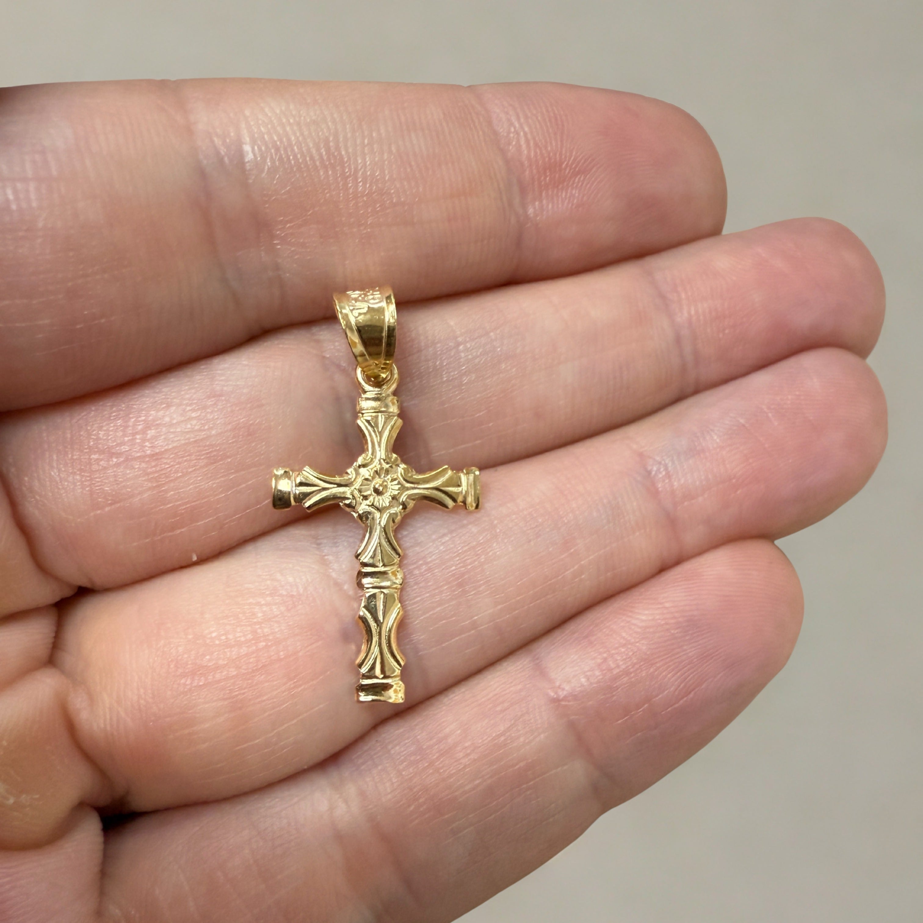 Solid 14K double bonded gold cross pendant with bold scrollwork and sculpted detailing, fine Christian jewelry. S Pendant Only close up image