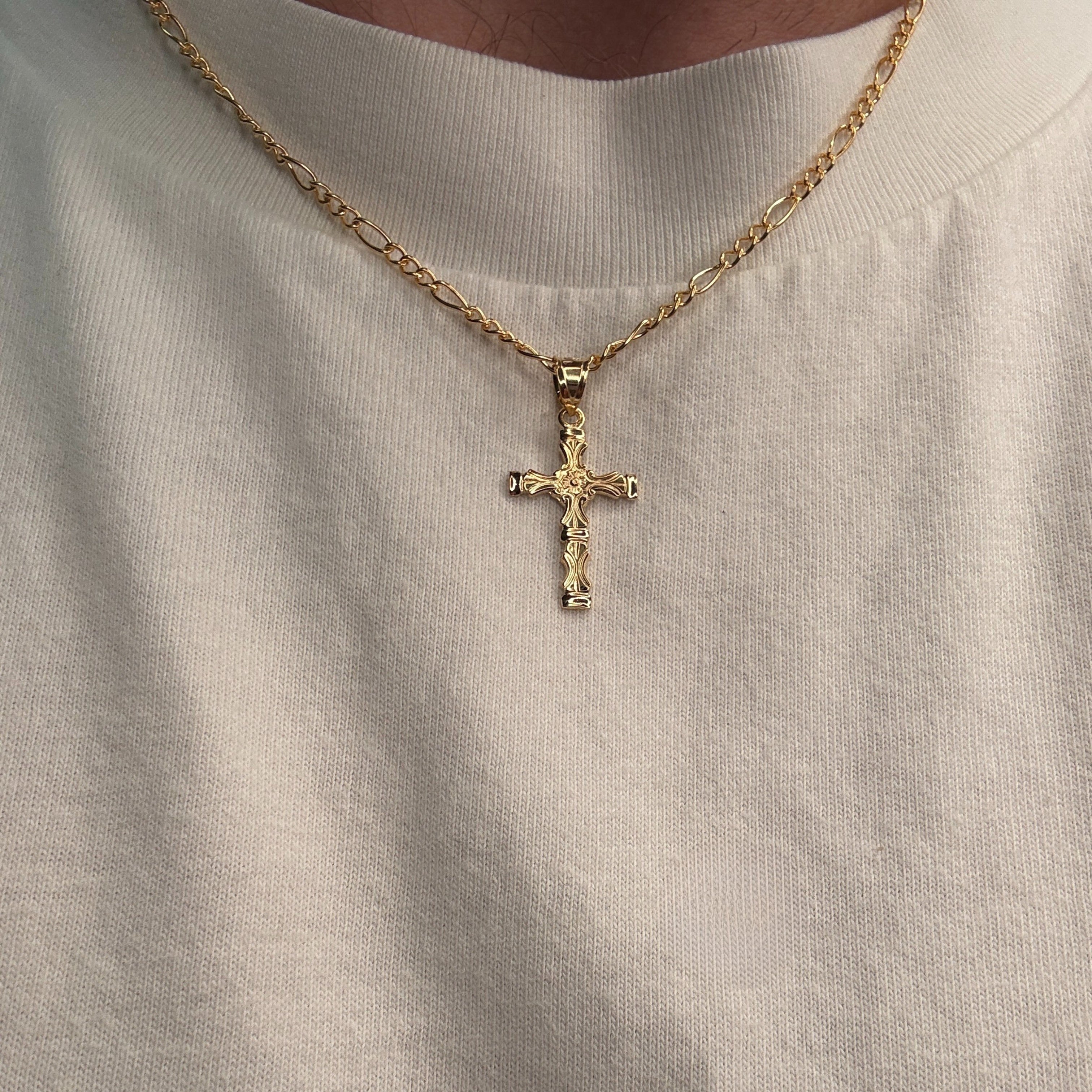 Solid 14K double bonded gold cross pendant with bold scrollwork and sculpted detailing, fine Christian jewelry. S Pendant Only on chain lifestyle image