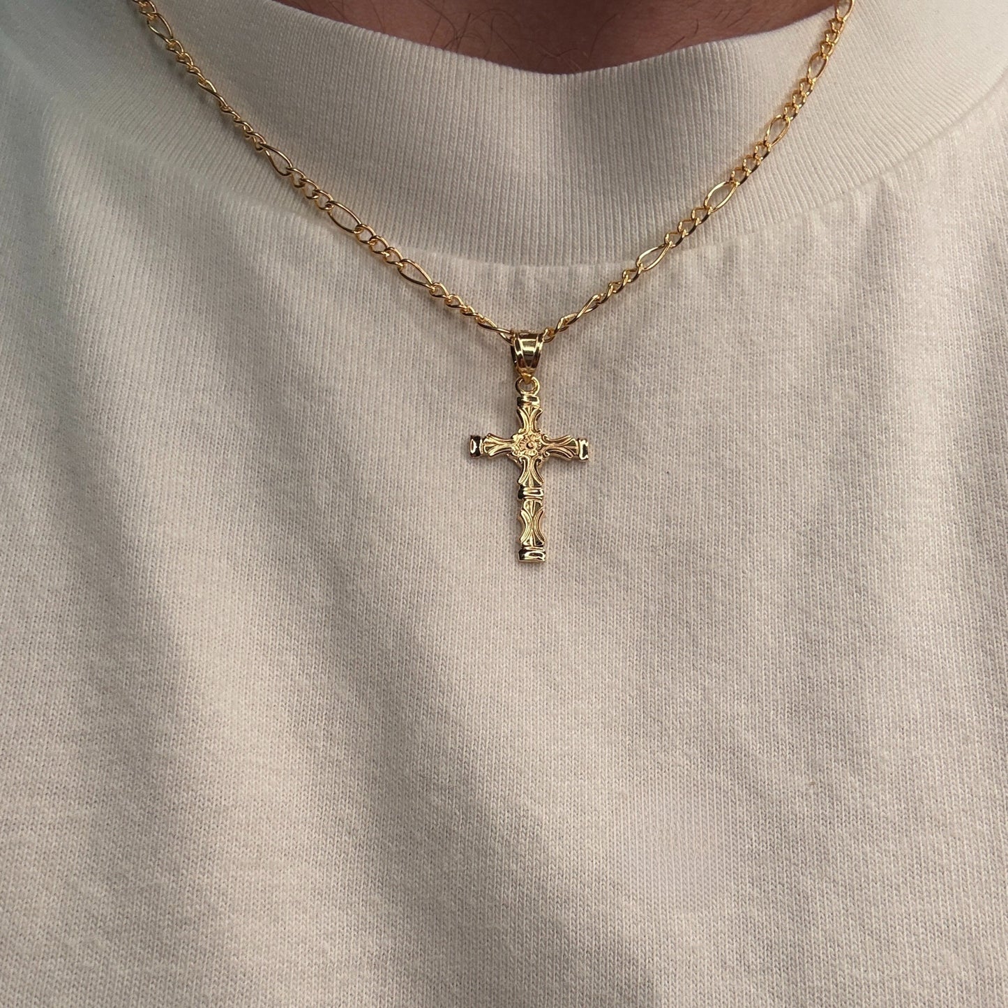Solid 14K double bonded gold cross pendant with bold scrollwork and sculpted detailing, fine Christian jewelry. S Pendant Only on chain lifestyle image
