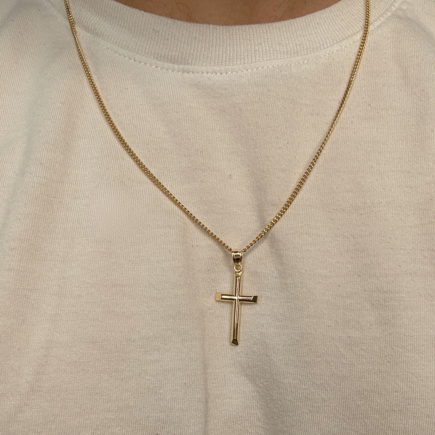 Solid 14K Double Bonded Gold timeless classic cross M pendant only lifestyle image on person