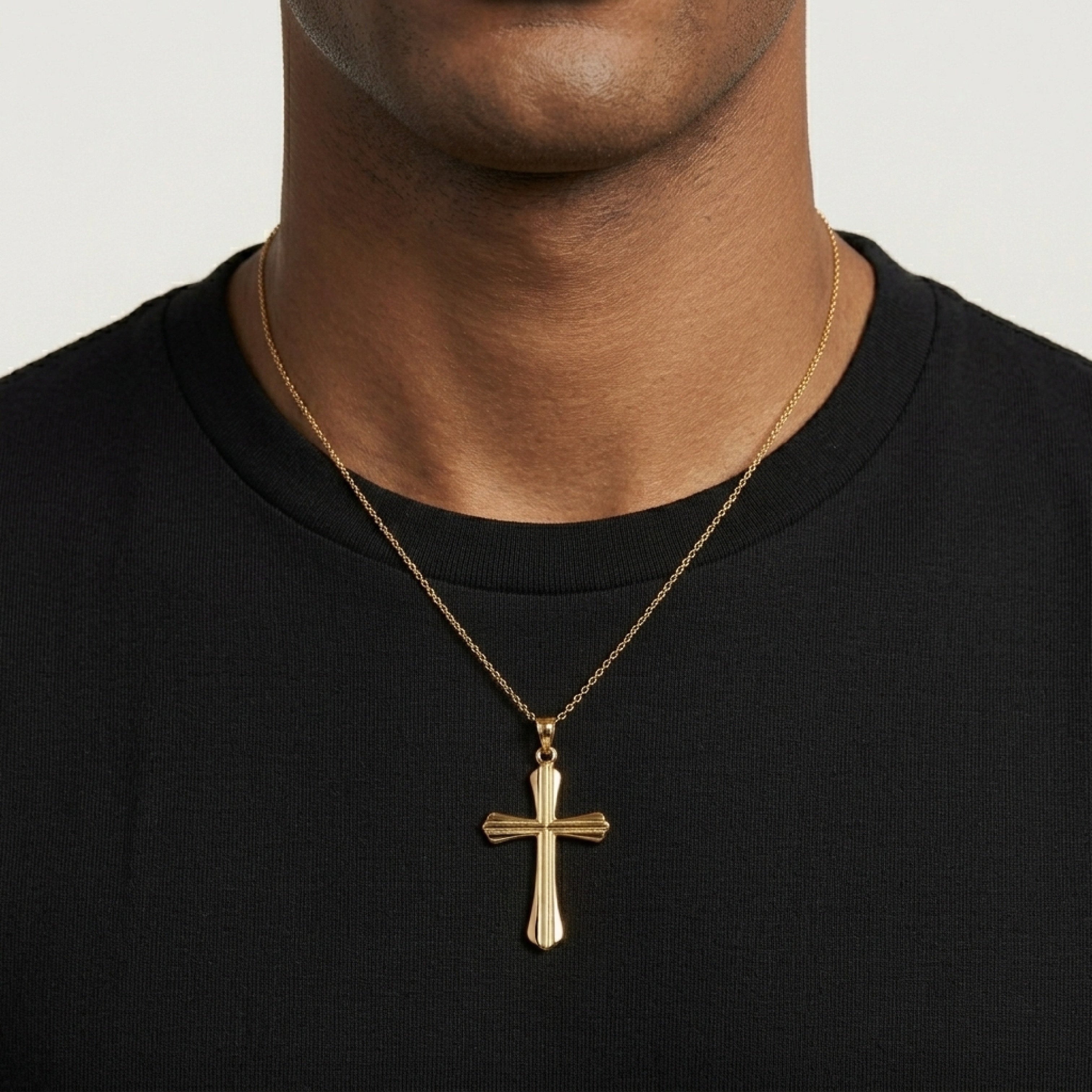 Solid 14K Double Bonded Gold Grooved Cross pendant only lifestyle image on man L