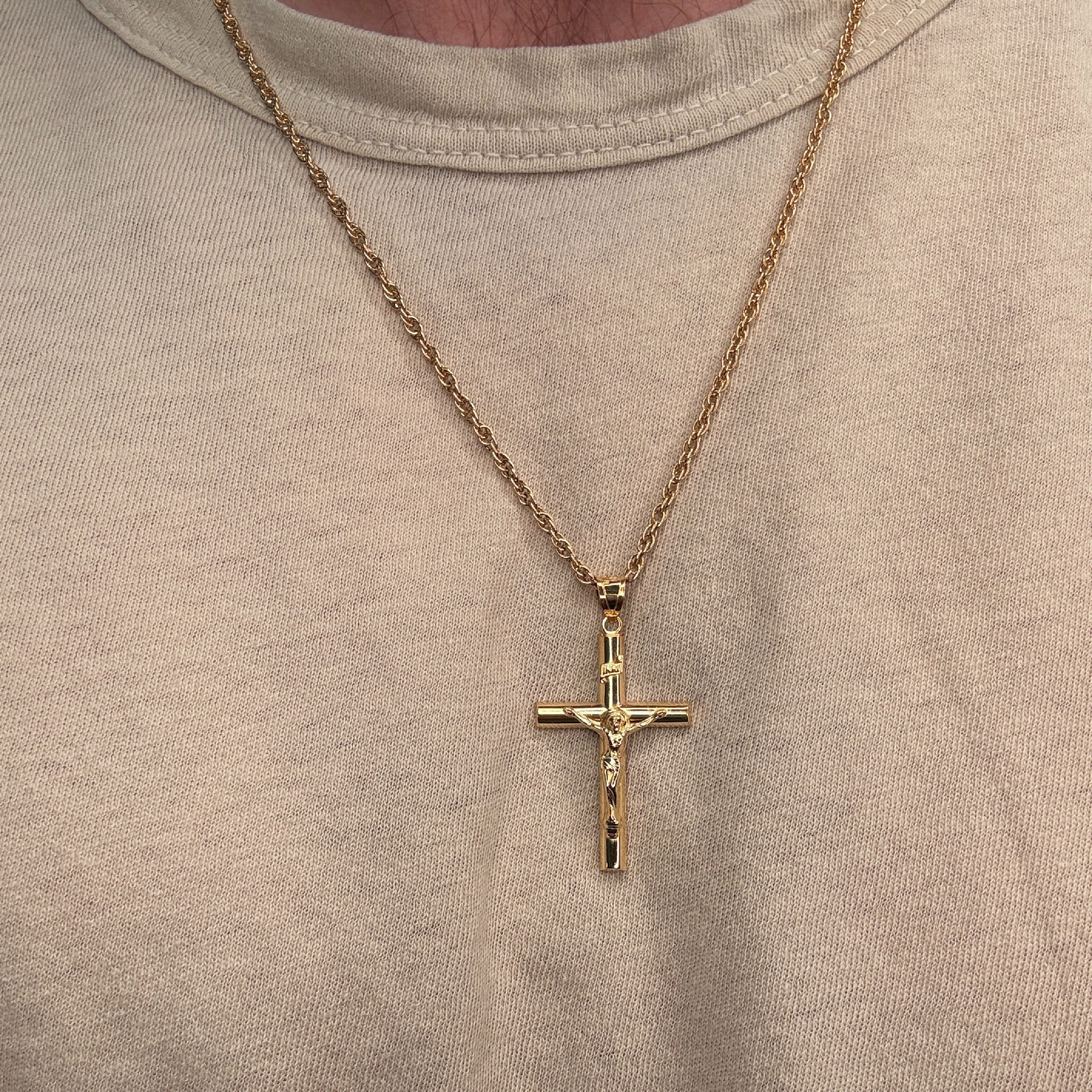 Solid 14K Double Bonded Gold INRI Crucifix pendant on rope chain lifestyle being worn image
