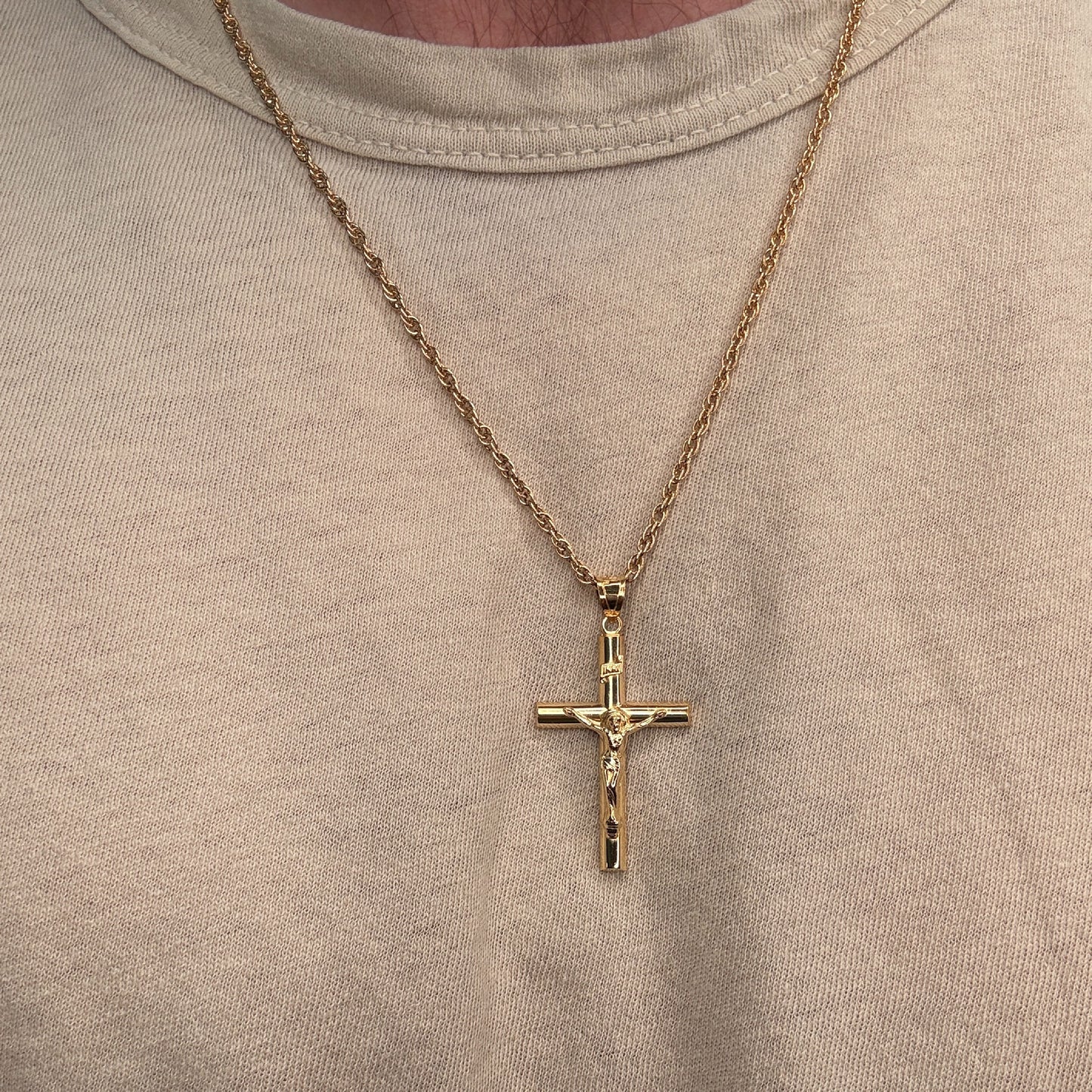 Solid 14K Double Bonded Gold INRI Crucifix pendant on rope chain lifestyle being worn image