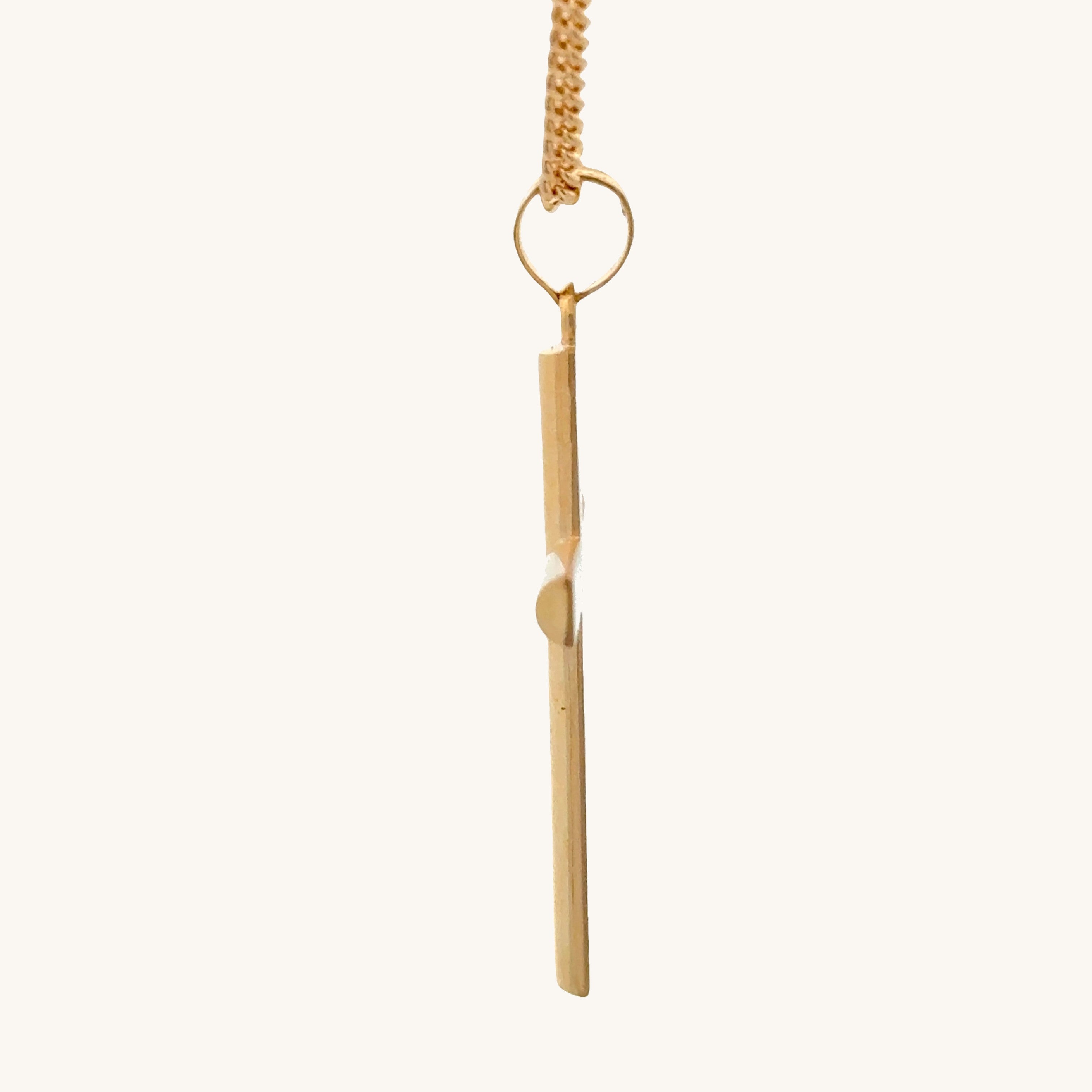 14K Double Bonded Gold Tube cross pendant on a gold filled cable chain against a white background side image