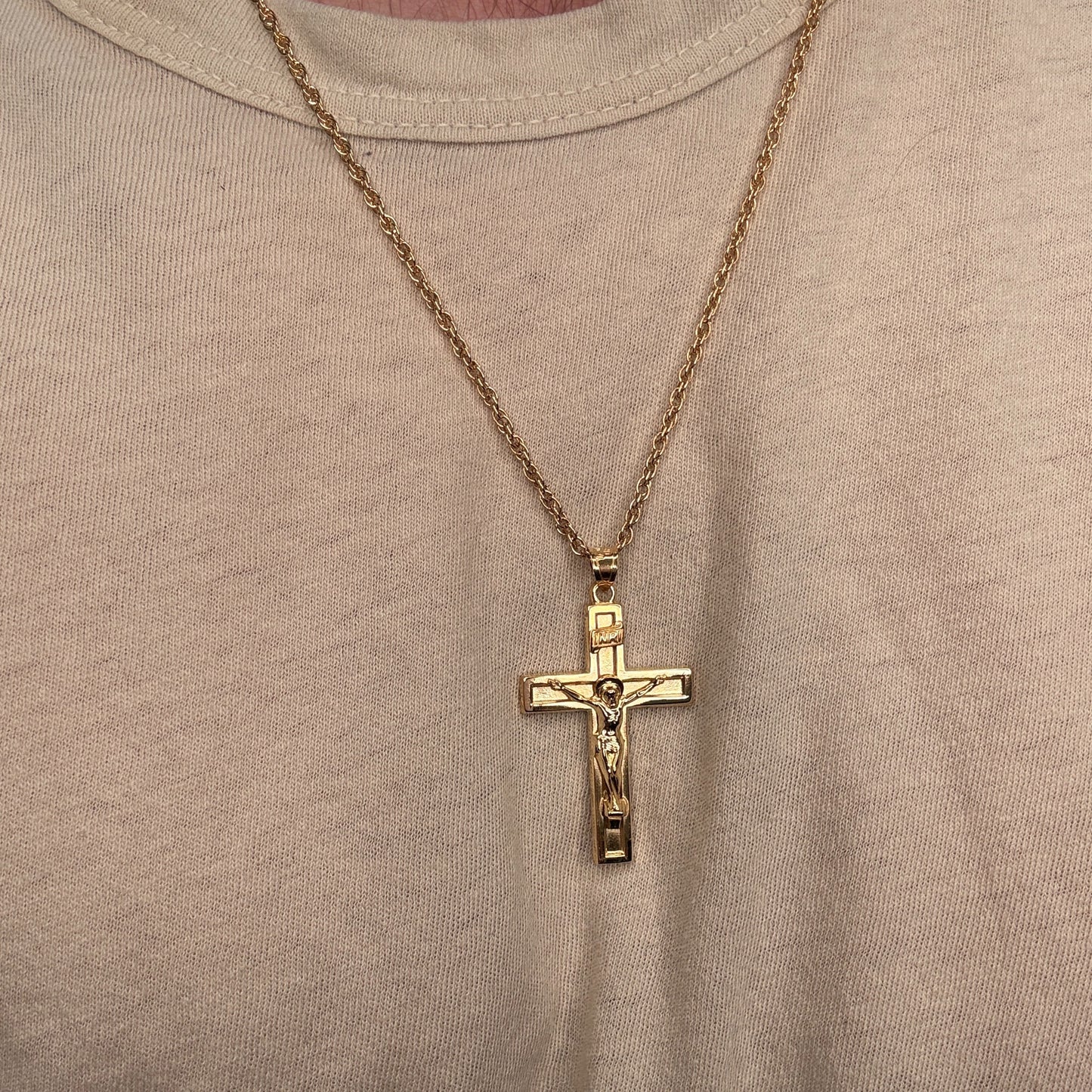 Solid 14K Double Bonded Gold XXL plain polished INRI Crucifix cross pendant on a rope chain lifestyle being worn