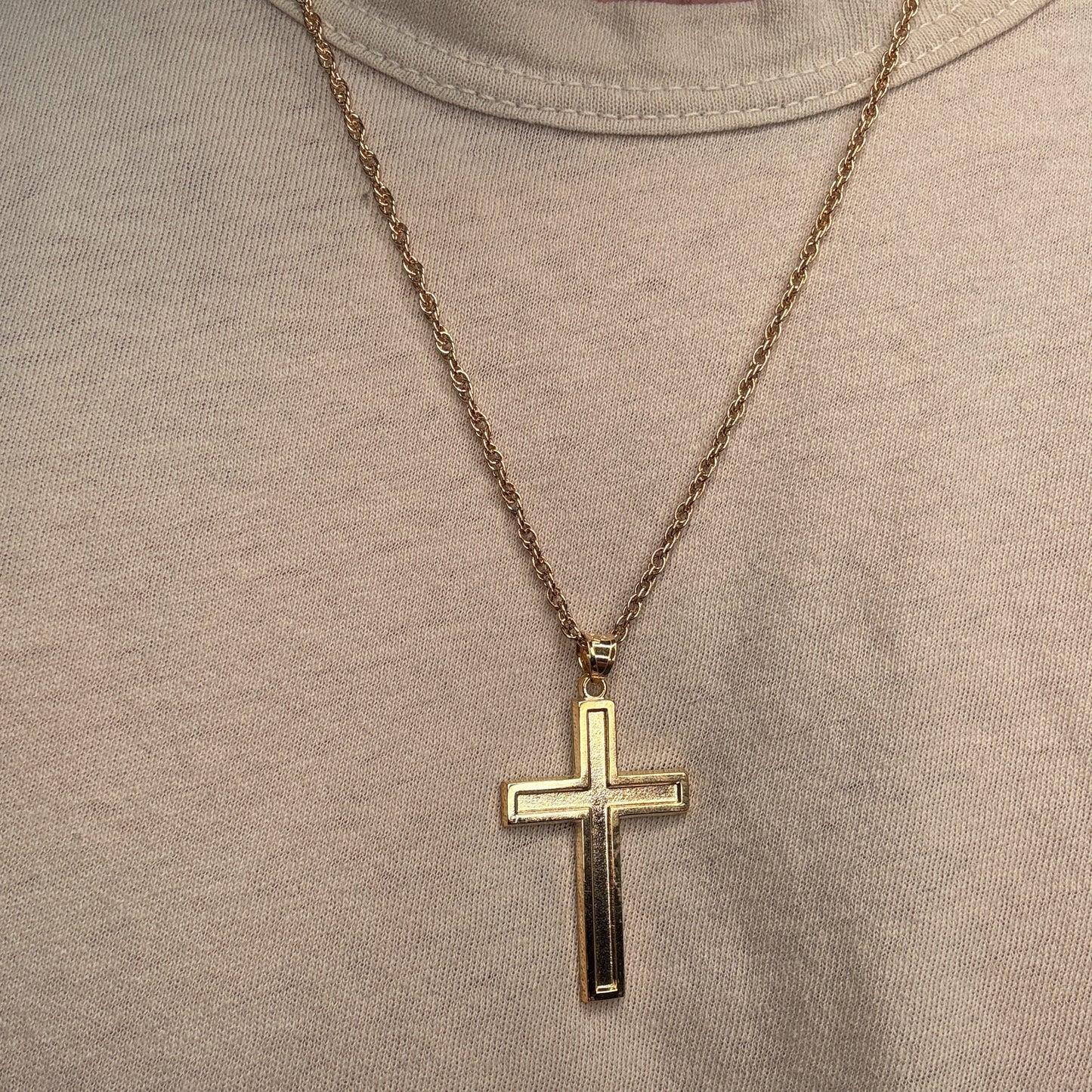 Solid 14K Double Bonded Gold XXL plain polished Cross pendant on a rope chain lifestyle being worn image
