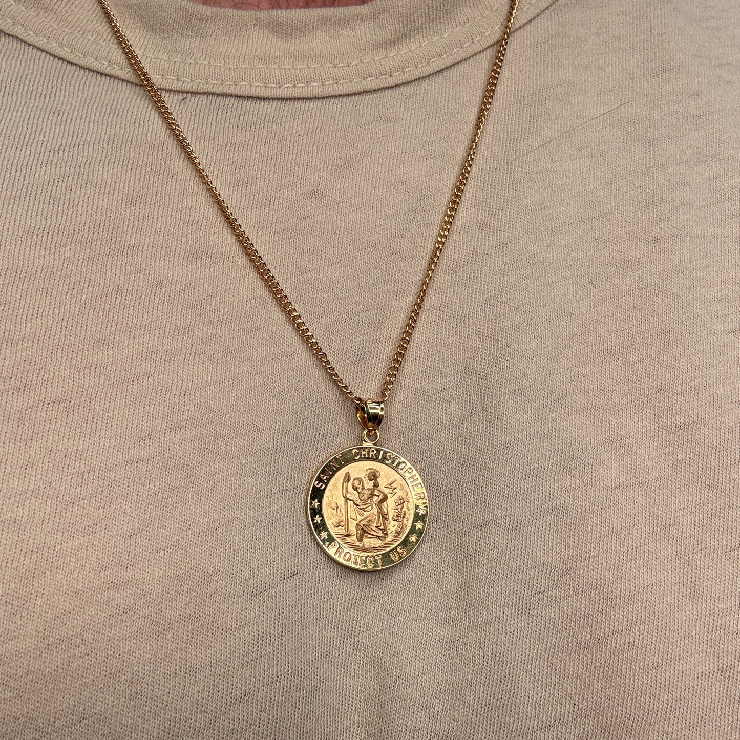 Solid 14K Double Bonded Gold Saint Christopher Medal XL (size of Quarter) L (size of Nickel) M (size of Dime) size on cable chain lifestyle being worn image
