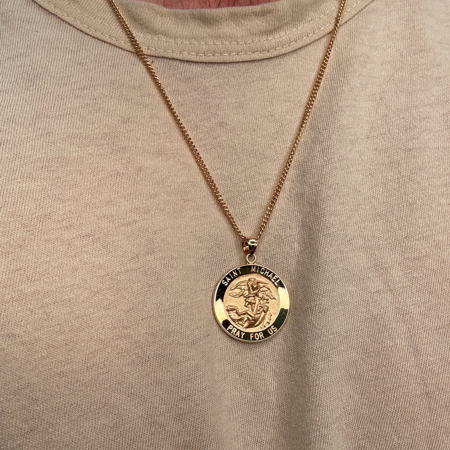 Solid 14K Double Bonded Gold Saint Michael pendant medal XL (size off Quarter) M (size of Dime) on cable chain lifestyle being worn image