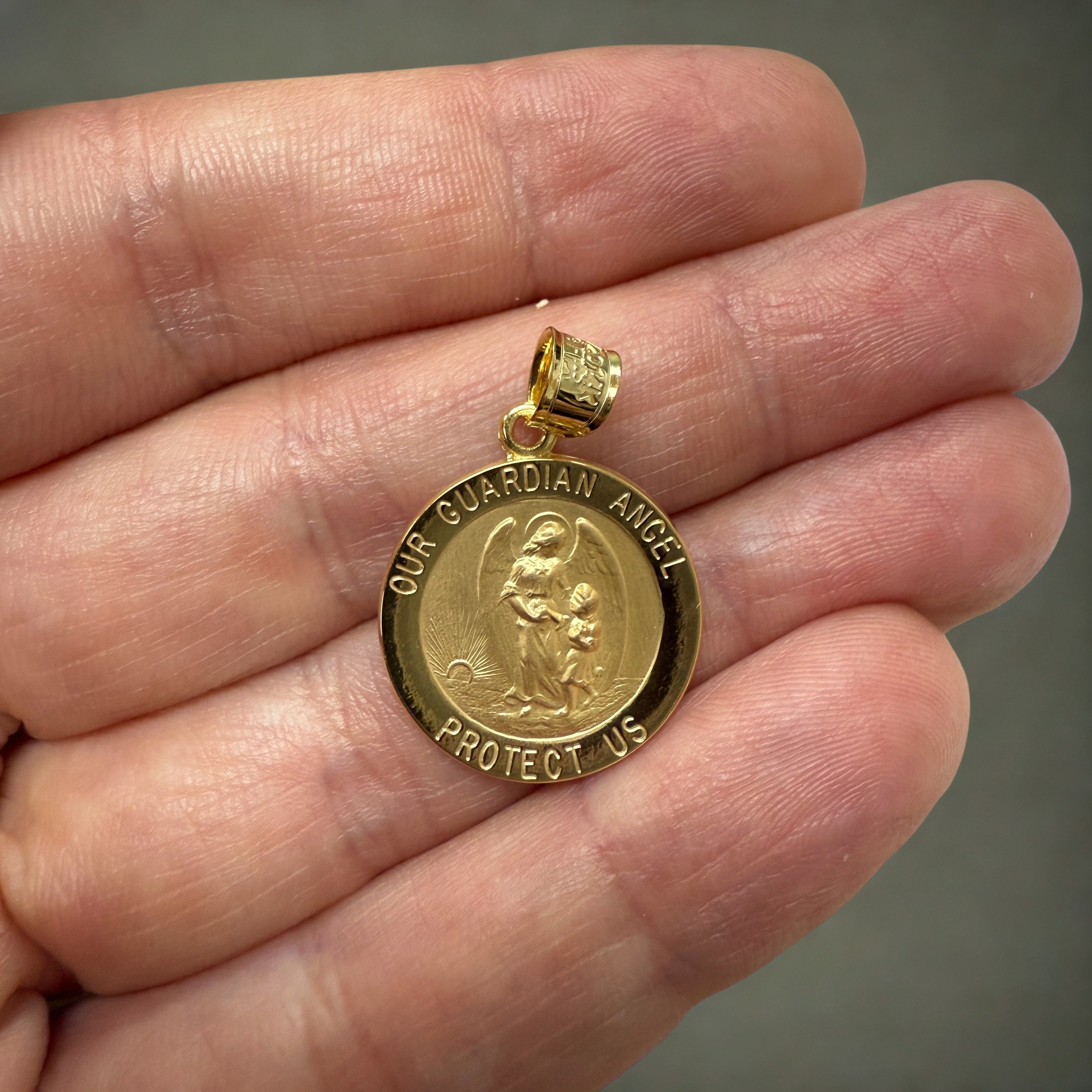 Solid 14K Double Bonded Gold Our Guardian Angel pendant medal M (size of Dime) lifestyle image close up