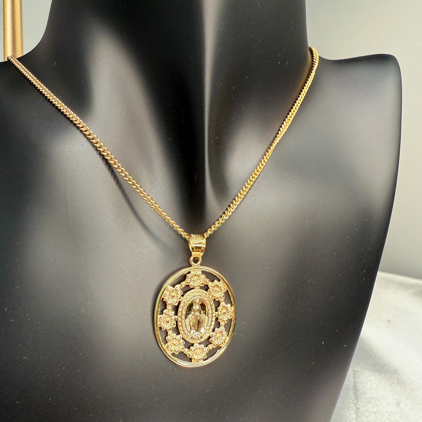 Solid 14K Double Bonded Gold Miraculous Virgin Mary Flower Frame medal pendant on a cable chain lifestyle image