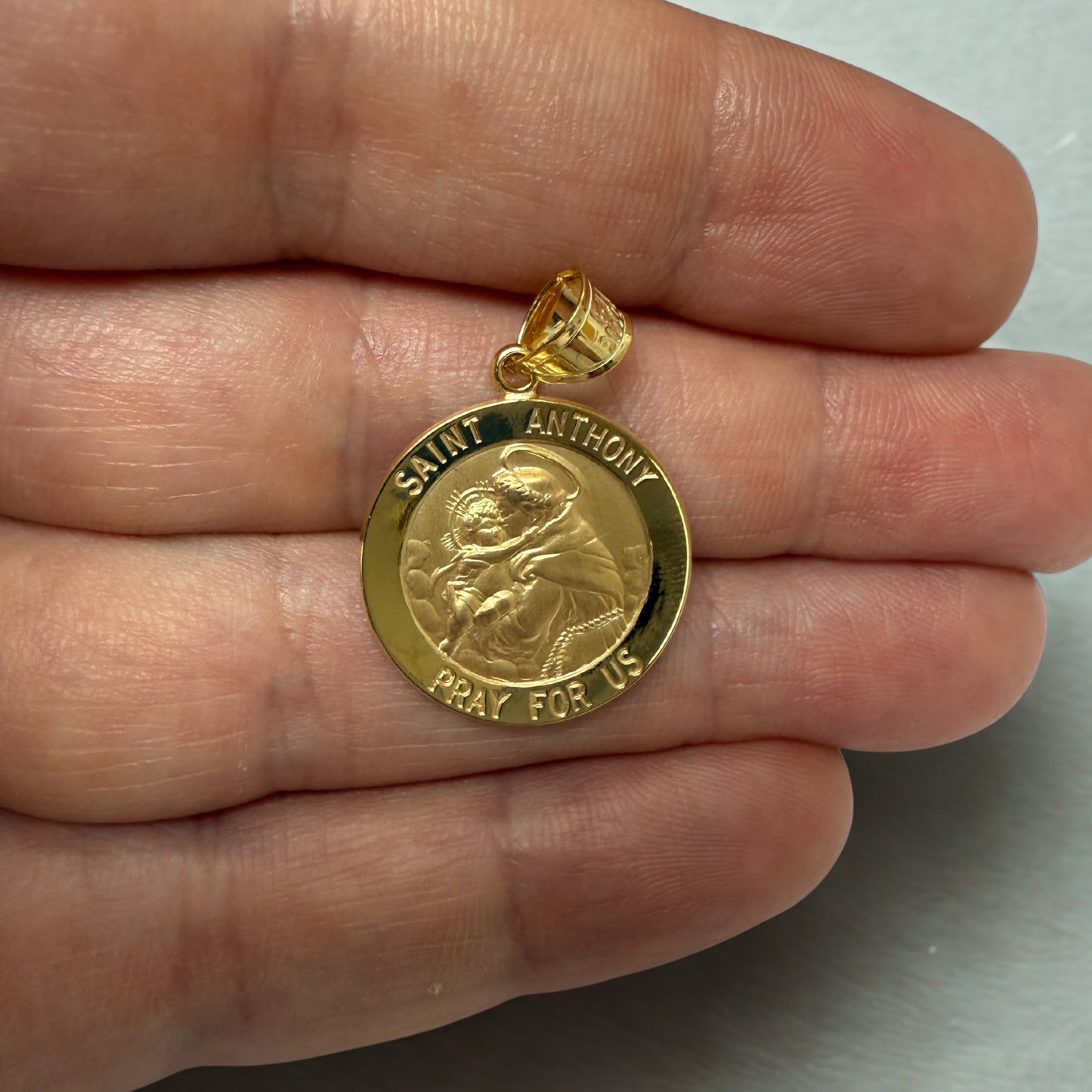 Solid 14K Double Bonded Gold Saint Anthony medal pendant lifestyle close up image