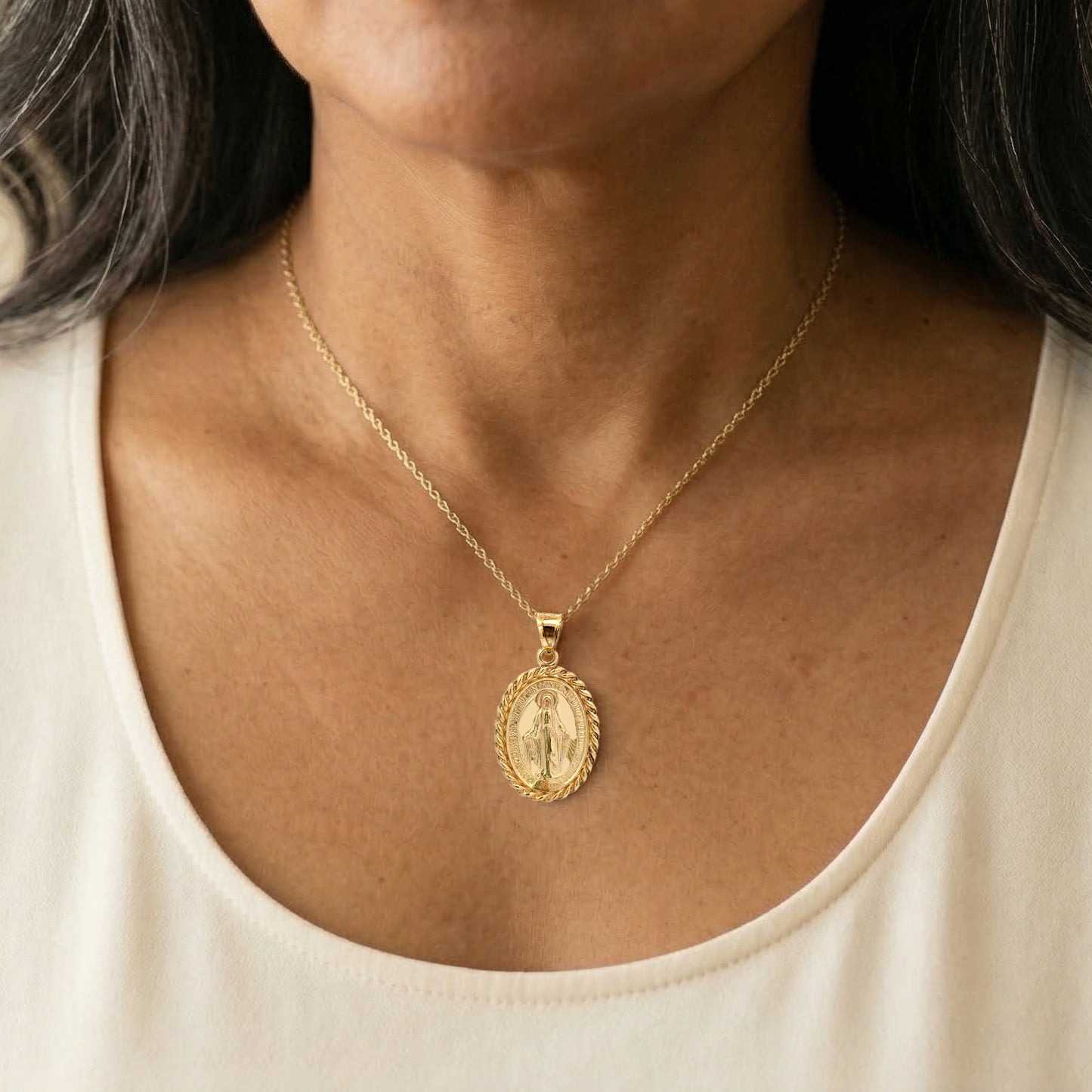 Solid 14K Double Bonded Gold Miraculous Virgin Mary Border medal pendant on chain lifestyle image on woman