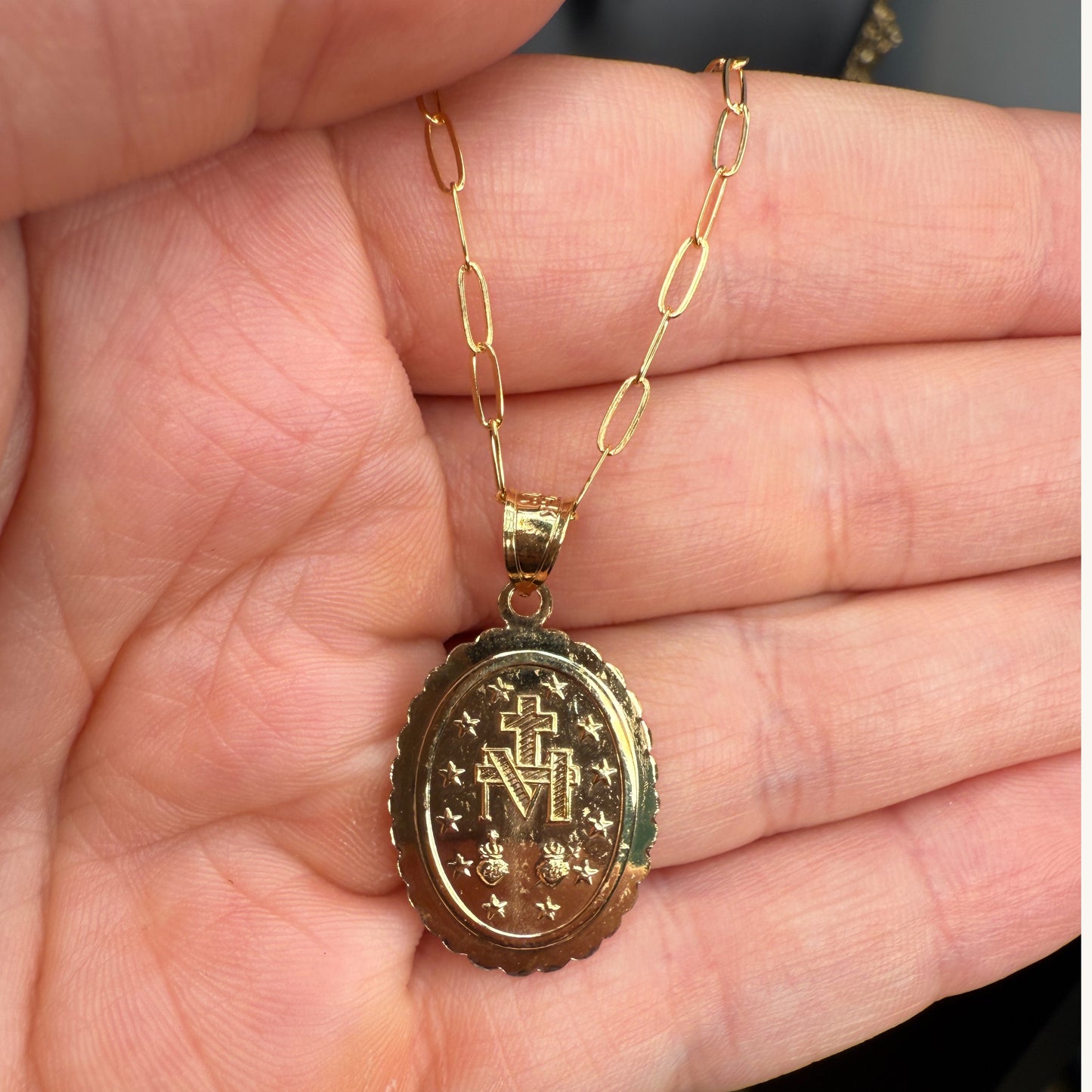 Solid 14K Double Bonded Gold Miraculous Virgin Mary Border medal pendant on paperclip chain lifestyle back image