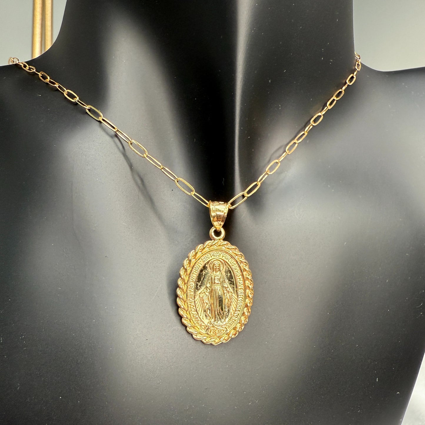 Solid 14K Double Bonded Gold Miraculous Virgin Mary Border medal pendant on paperclip chain lifestyle image