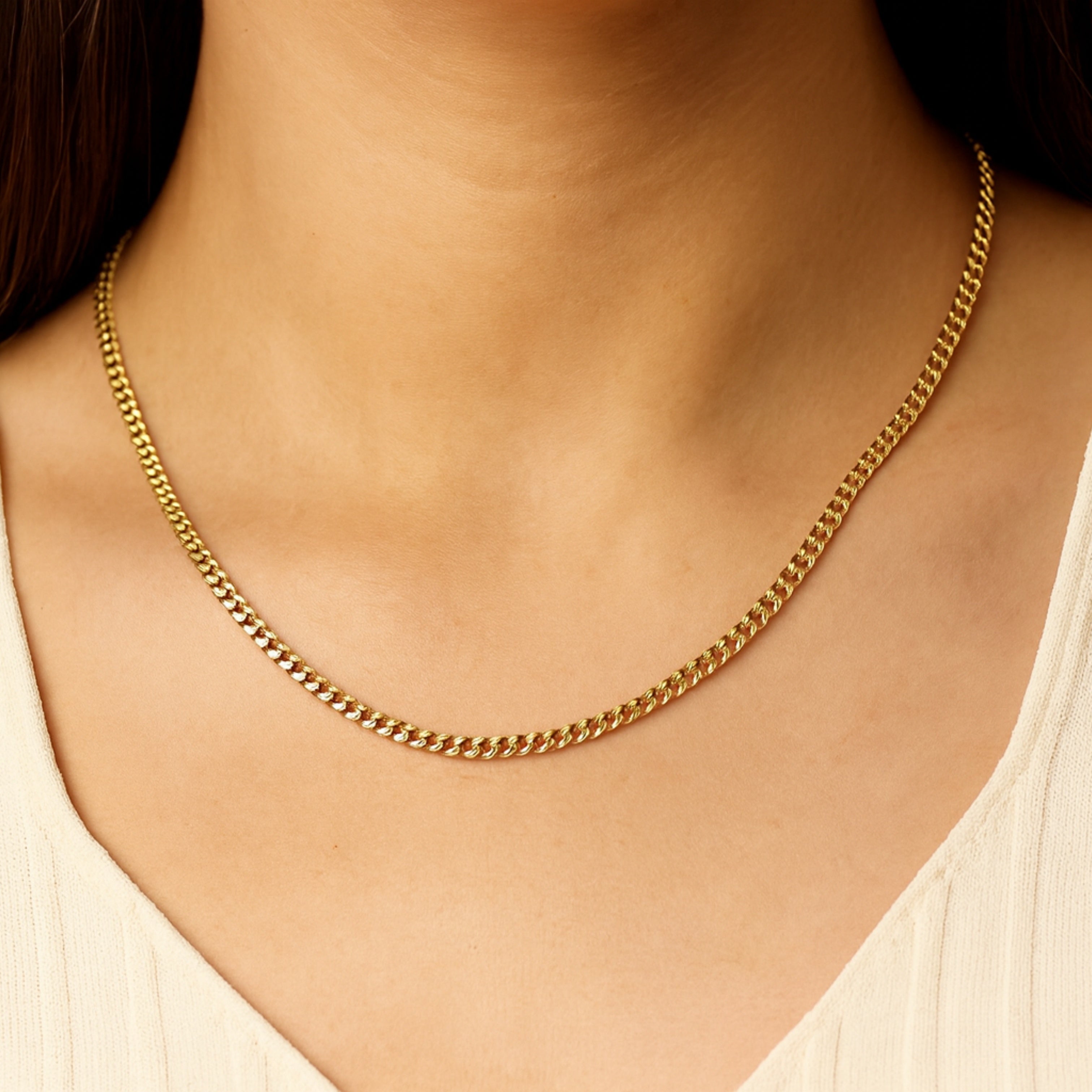 14K Double Bonded Gold 22" cable chain lifestyle image on woman
