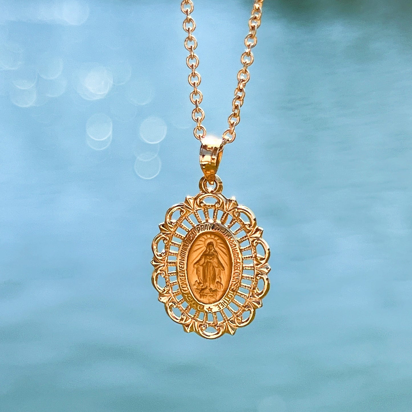 14K Yellow Gold Pierced Frame Miraculous Medal S lifestyle on chain necklace